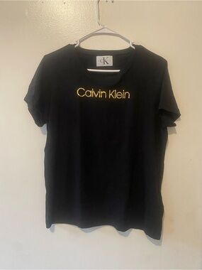 Calvin Klein Black Tee with Metallic Gold Logo Print
